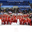 GANGNEUNG, SOUTH KOREA - FEBRUARY 25: Olympic Athletes from Russia players and staff celebrating after a 4-3 gold medal game overtime win against Germany at the PyeongChang 2018 Olympic Winter Games. (Photo by Andre Ringuette/HHOF-IIHF Images)

